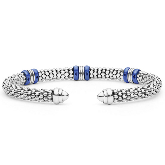 Sterling silver cuff with blue ceramic accents.