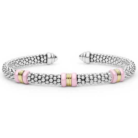 Sterling silver cuff with pink ceramic accents.