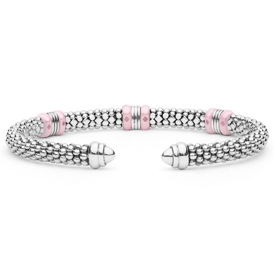 Sterling silver cuff with pink ceramic accents.