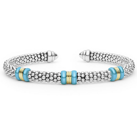 Sterling silver cuff with turquoise accents.