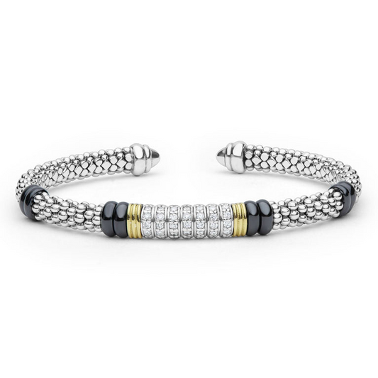 Sterling silver cuff with diamond accents.