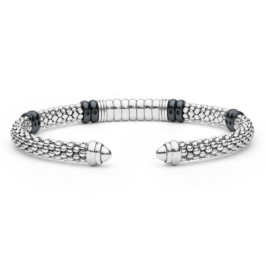 Sterling silver cuff bracelet with beaded design.