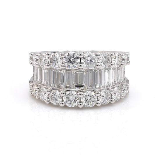 14K white gold band with round, baguette diamonds.