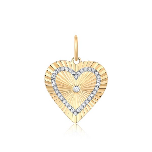 Heart-shaped gold necklace with diamond accents.