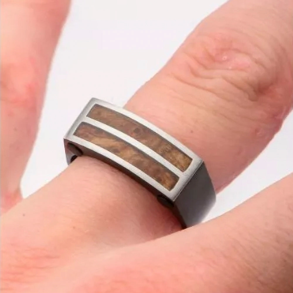 Black stainless steel ring with wood inlay.