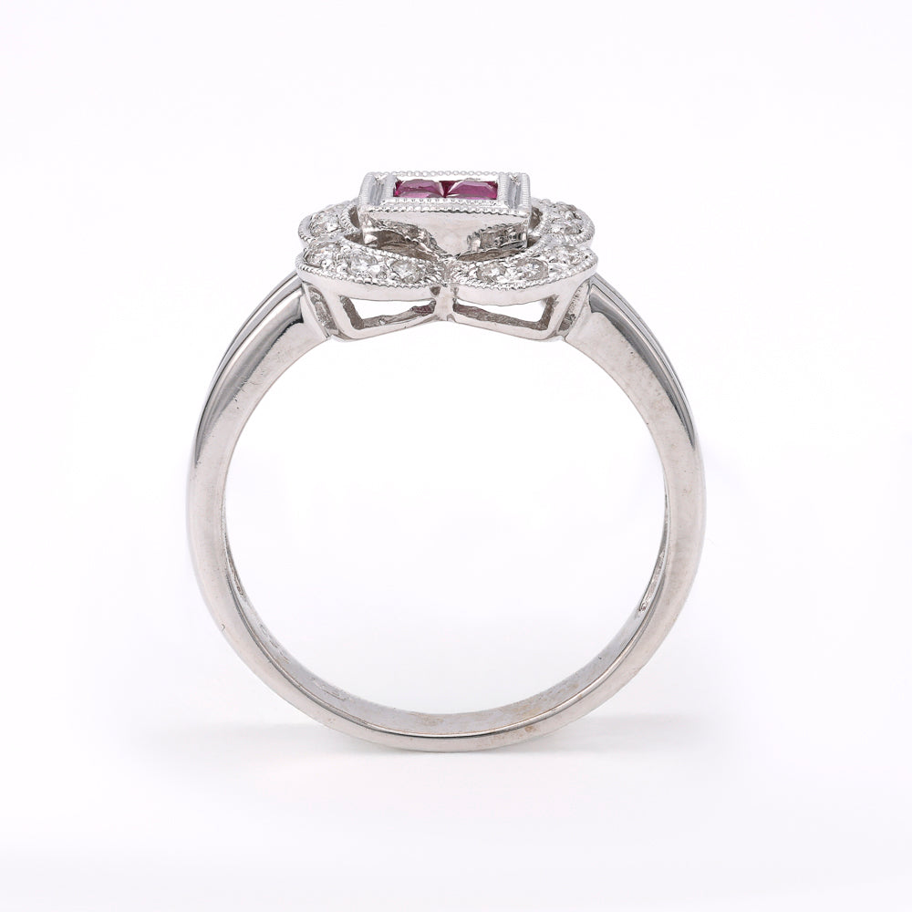 18K white gold ring with rubies, diamonds.