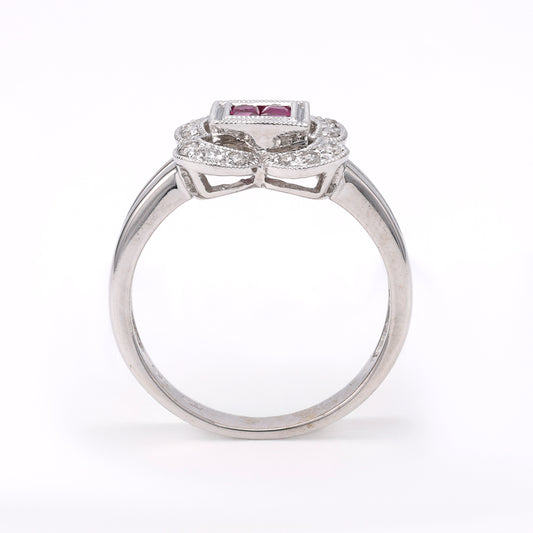 18K white gold ring with rubies, diamonds.