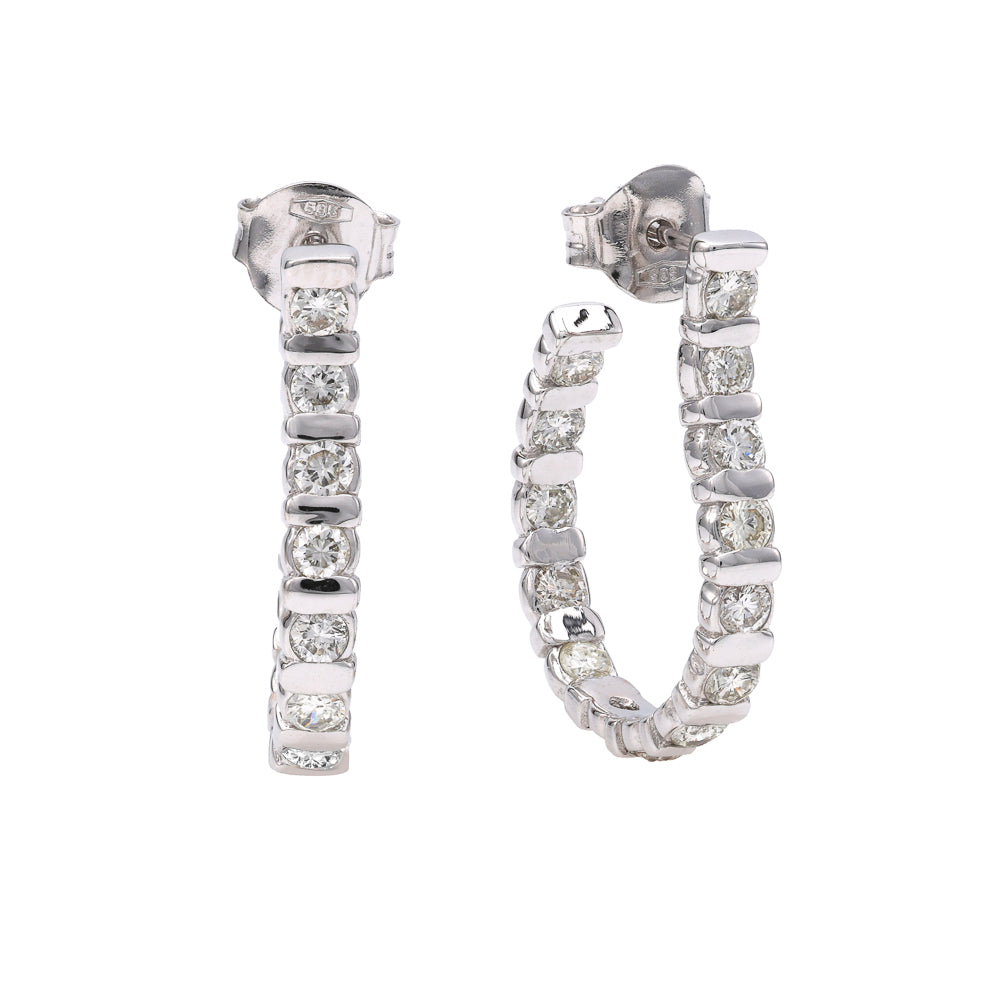 J Hoop diamond earrings in white gold.