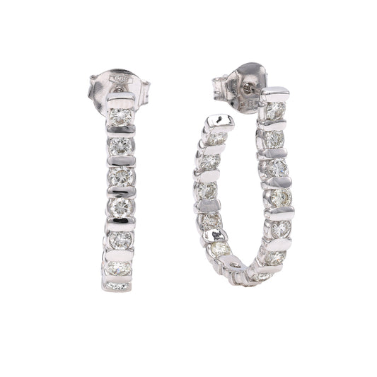 J Hoop diamond earrings in white gold.