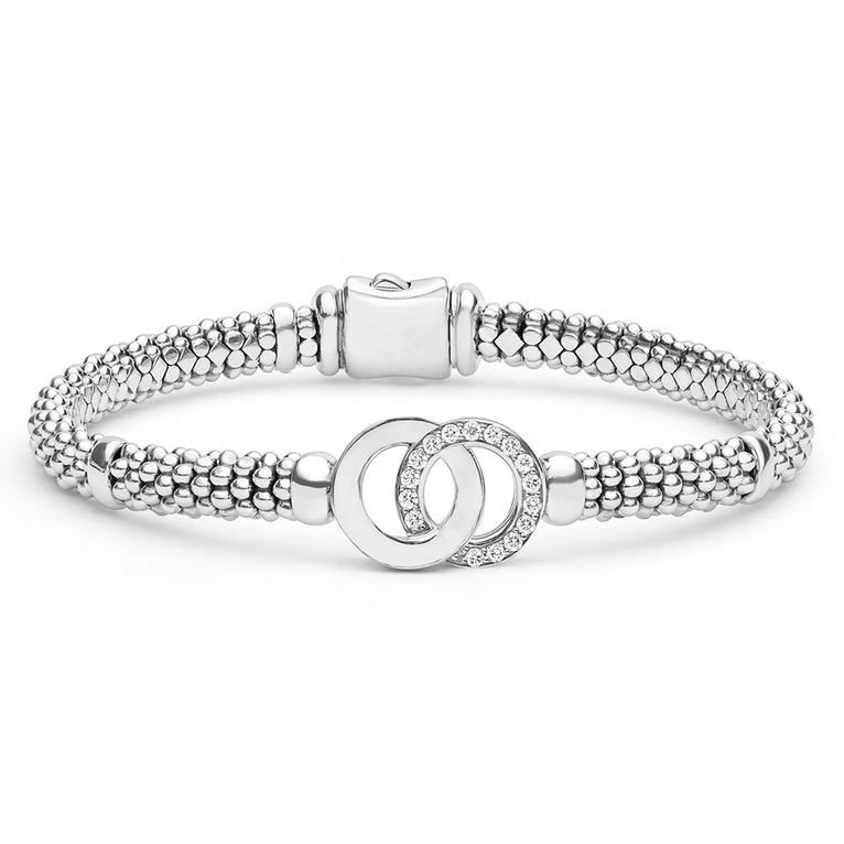 Sterling silver bracelet with diamond interlocking circles.