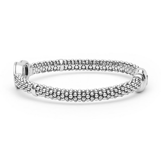 Sterling silver beaded diamond bracelet.