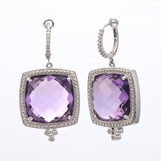 Purple amethyst dangle earrings in white gold.