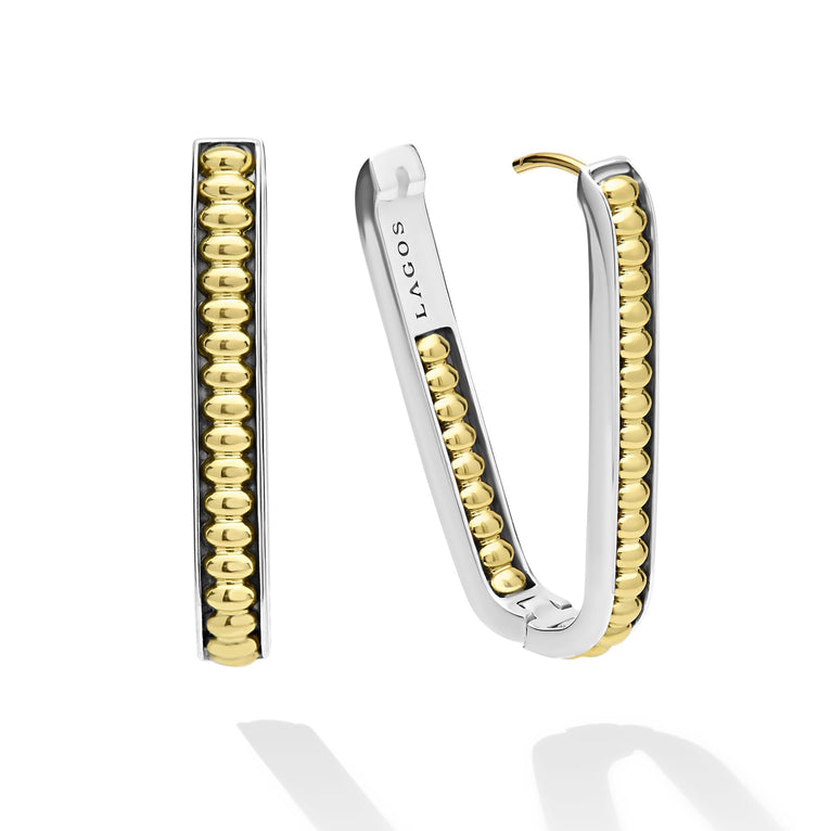 Sterling silver oval hoops with gold beads.