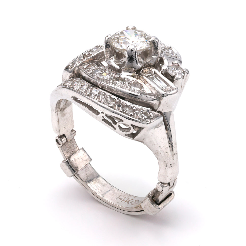 Platinum ring with round and baguette diamonds.