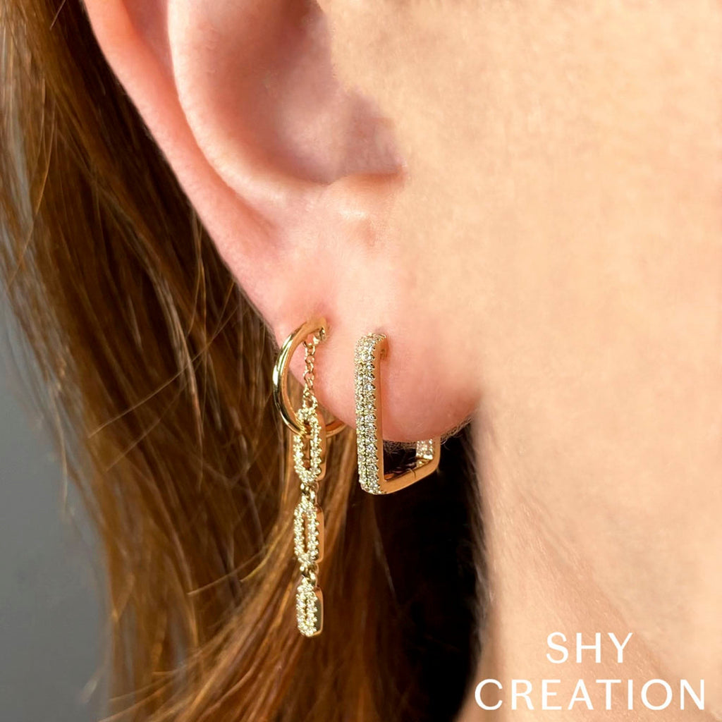Square hoop diamond earrings in white gold.