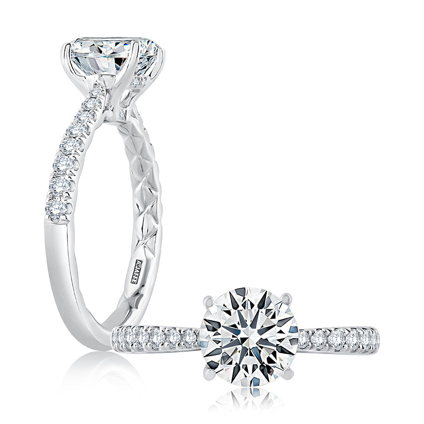 14K white gold ring with round diamonds.