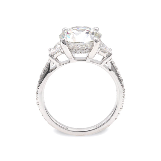 18K white gold ring with round diamonds.