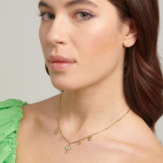Yellow stainless steel necklace with simulated diamonds.