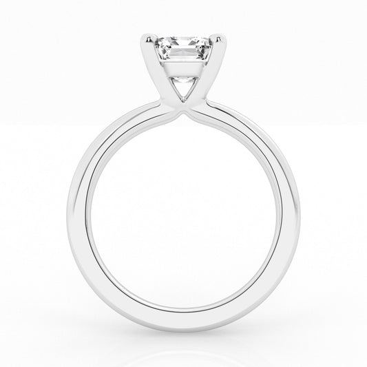 Emerald-cut diamond solitaire, white gold band.
