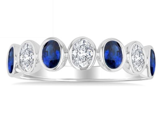 Oval sapphire and diamond band in yellow gold.
