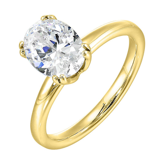 Yellow gold ring with oval diamond centerpiece.