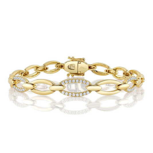 Yellow gold bracelet with diamond-accented links.