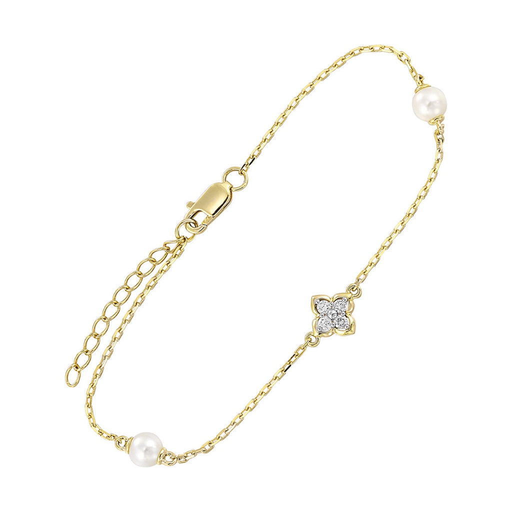 Yellow gold bracelet with diamonds and pearls.