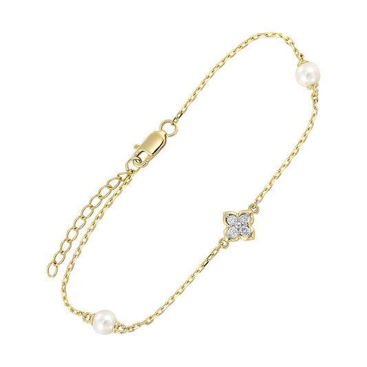 Yellow gold bracelet with diamonds and pearls.