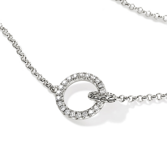 Sterling silver circle necklace with diamonds.