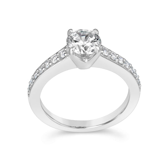 18K white gold ring with side diamonds.
