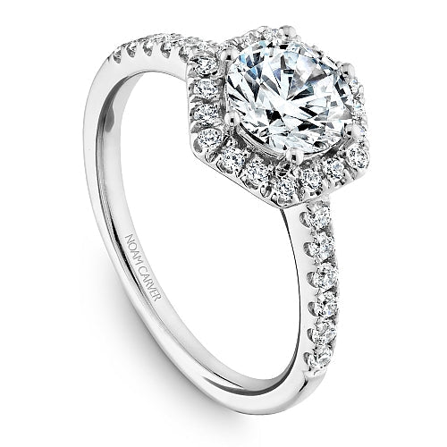 Halo diamond ring in white gold.