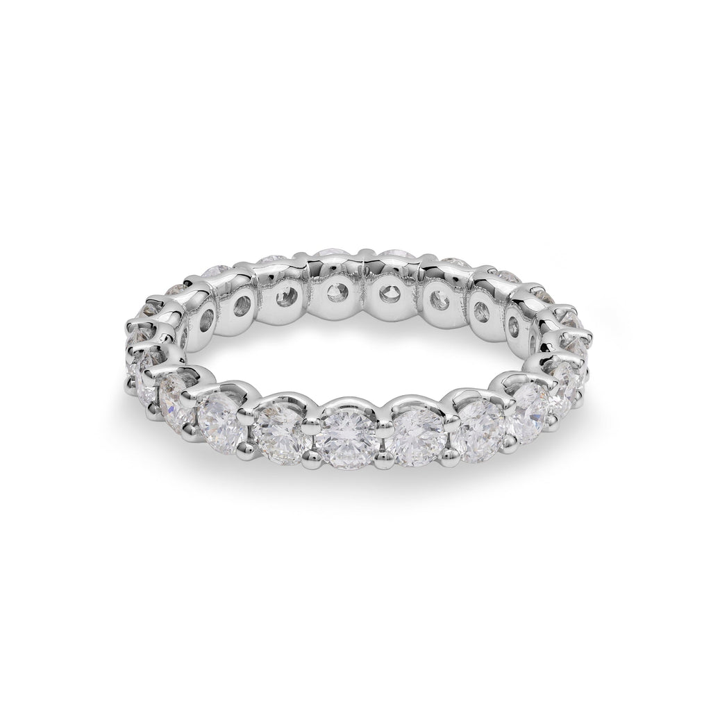 Platinum band with round diamonds.