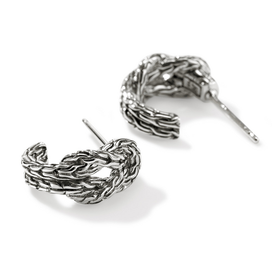 Sterling silver twisted J hoop earrings.