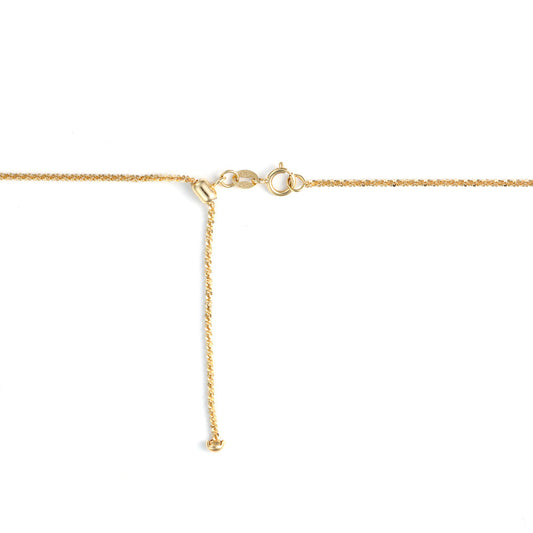 Yellow gold necklace clasp detail.