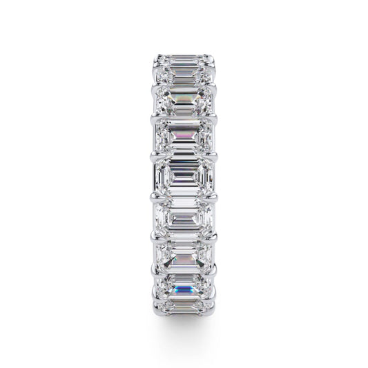 Emerald-cut diamond eternity band in white gold.