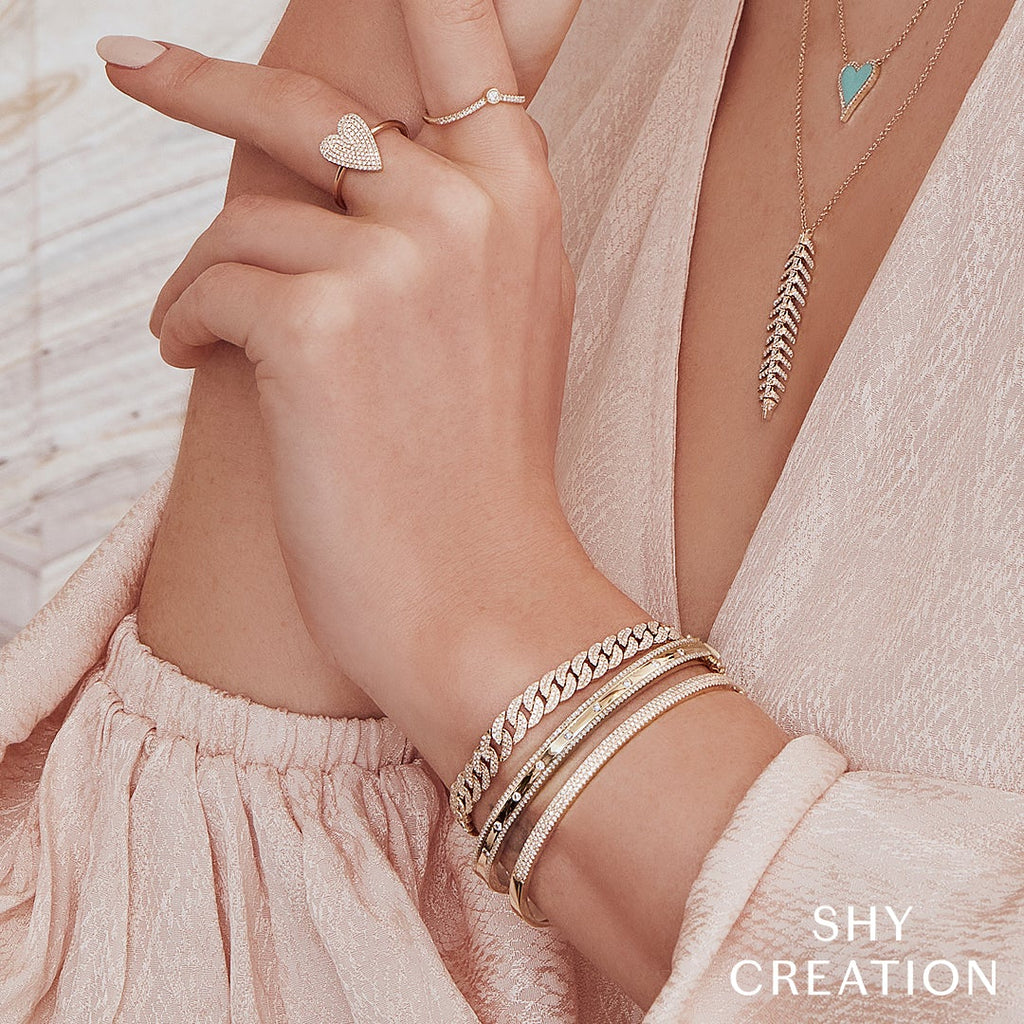 Yellow gold ring with round diamonds.