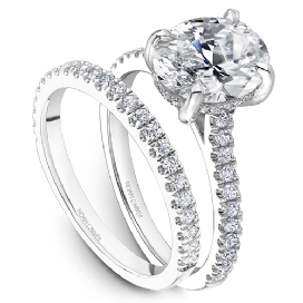 14K white gold band with round diamonds.