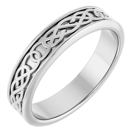 Carved white gold band with intricate design.