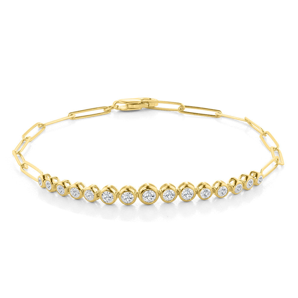 Yellow gold bracelet with round diamonds.