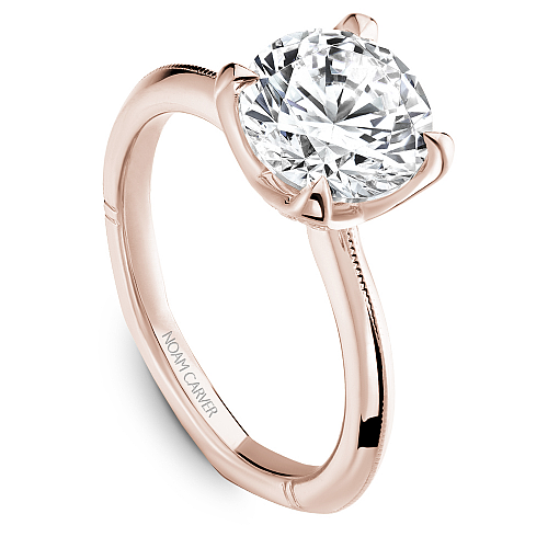 Rose gold ring with large round diamond.