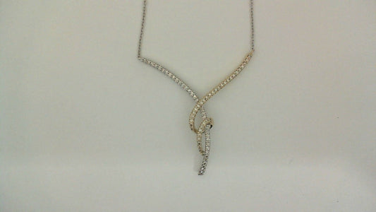 White-yellow gold diamond twist necklace.