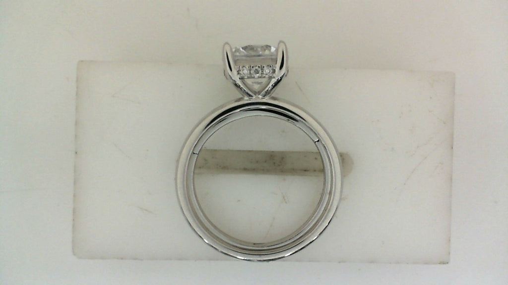 14K white gold ring with accent diamonds.
