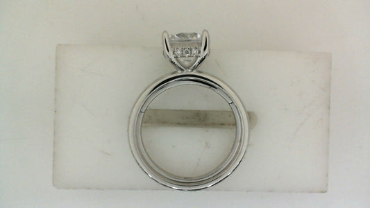 14K white gold ring with accent diamonds.