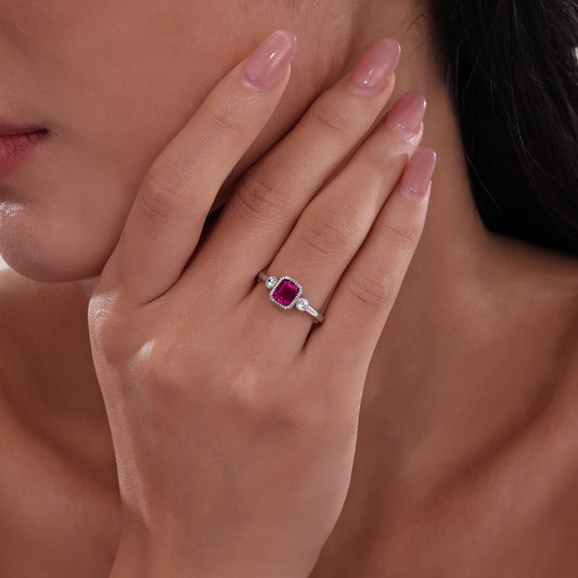 Emerald-cut ruby ring, platinum-bonded silver band.
