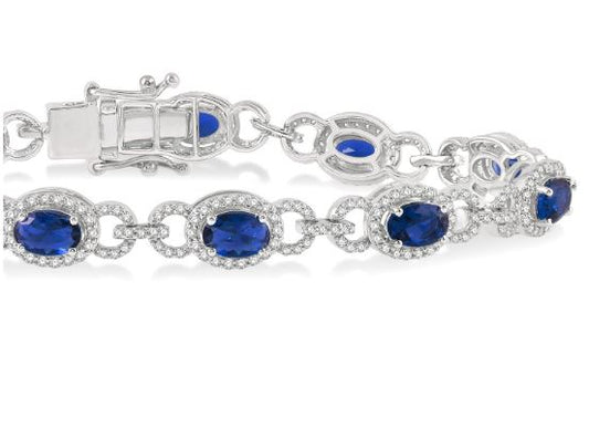 Oval sapphire and diamond station bracelet.