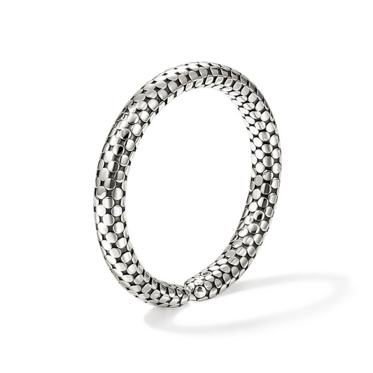 Sterling silver cuff bracelet with hexagonal pattern.