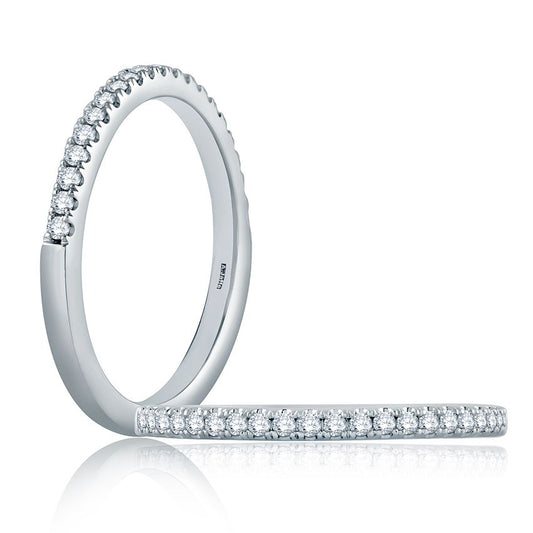 Stackable white gold diamond wedding band.