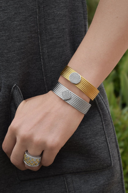 Diamond bracelet with white and yellow bands.