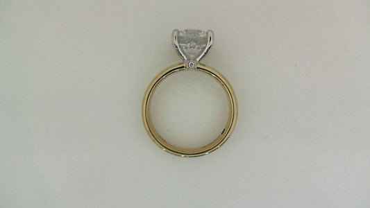14K yellow gold ring with hidden diamond accent.