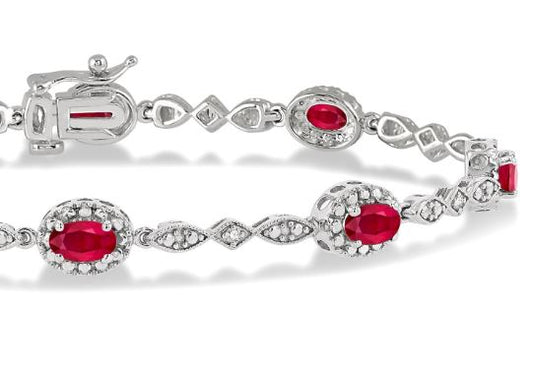 Oval ruby and diamond station bracelet.